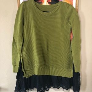 Green sweater with lace hemline